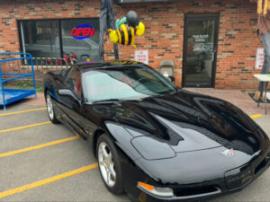 Image of the raffle item a black 50th anniversary Corvette