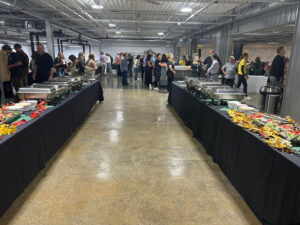 Two of the buffet lines with various food items at the 2024 Annual Pollinator Project Gala